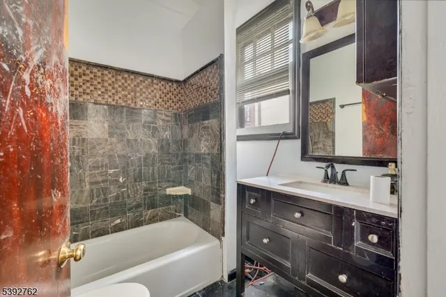 a view of a street with cars