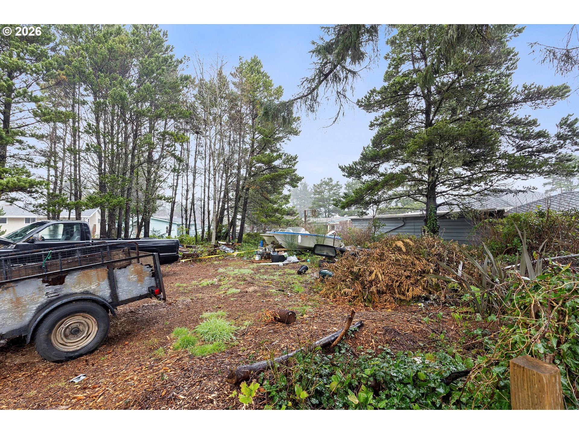 1032 Southwest 14th Street Lincoln City, OR 97367 - Photo 5 of 7 a view of outdoor space with trees