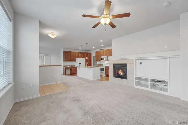 a view of a kitchen with a sink and a window