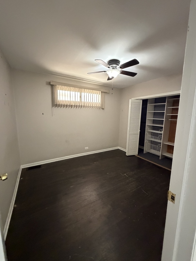 6551 West 63rd Street Chicago, IL 60638 - Photo 7 of 9 a view of an empty room with a window