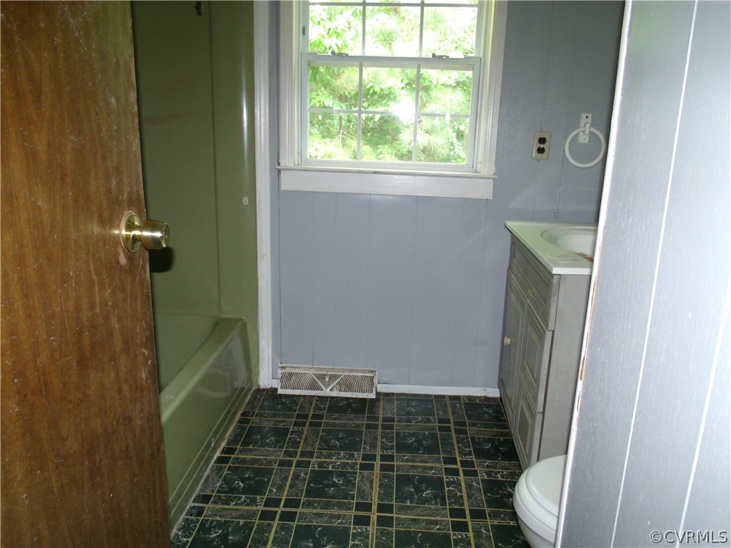 248 Skelton Road Victoria, VA 23974 - Photo 12 of 15 a bathroom with a sink and toilet