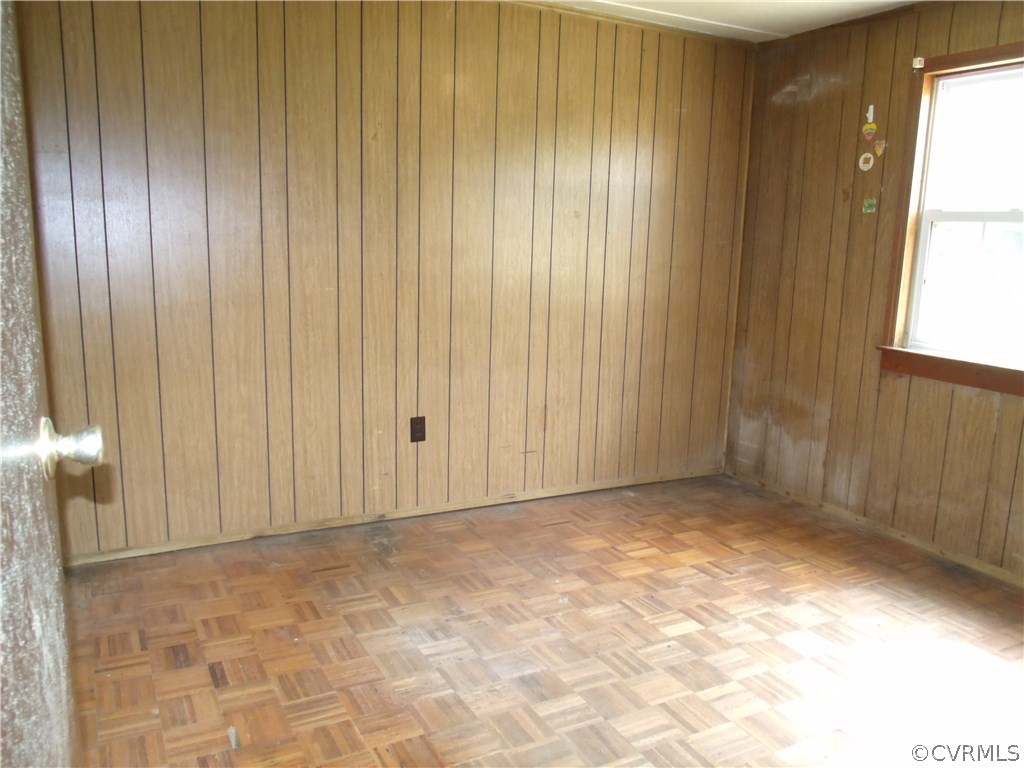 248 Skelton Road Victoria, VA 23974 - Photo 13 of 15 a view of an empty room with window and balcony view