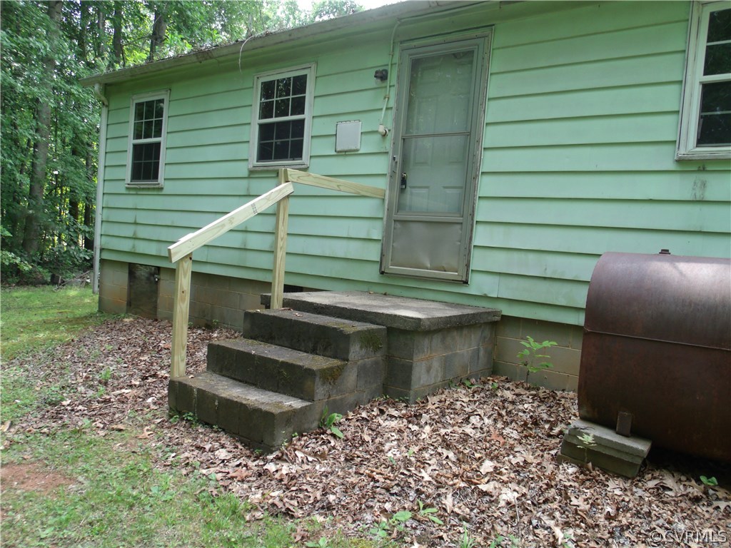 248 Skelton Road Victoria, VA 23974 - Photo 4 of 15 a front view of a house with a yard