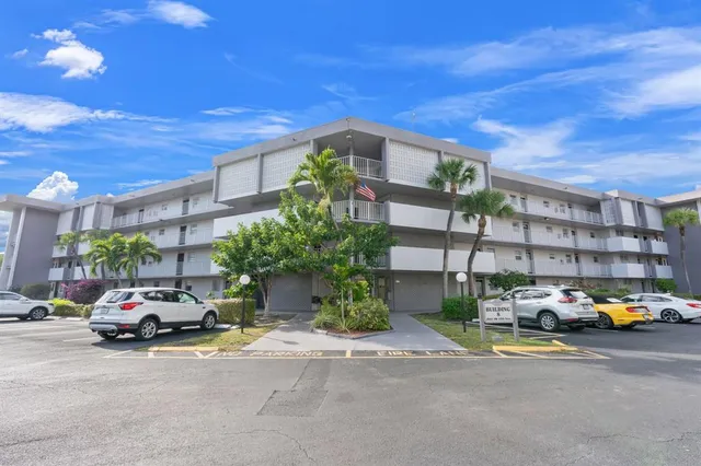 a cars parked in front of a building