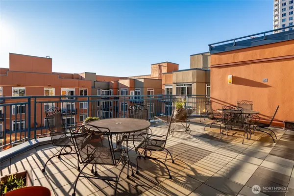 a view of a balcony with chairs