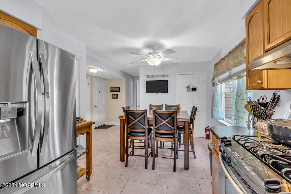 3 Ash Road Jackson, NJ 08527 - Photo 11 of 21 a view of a dining room with furniture and a kitchen