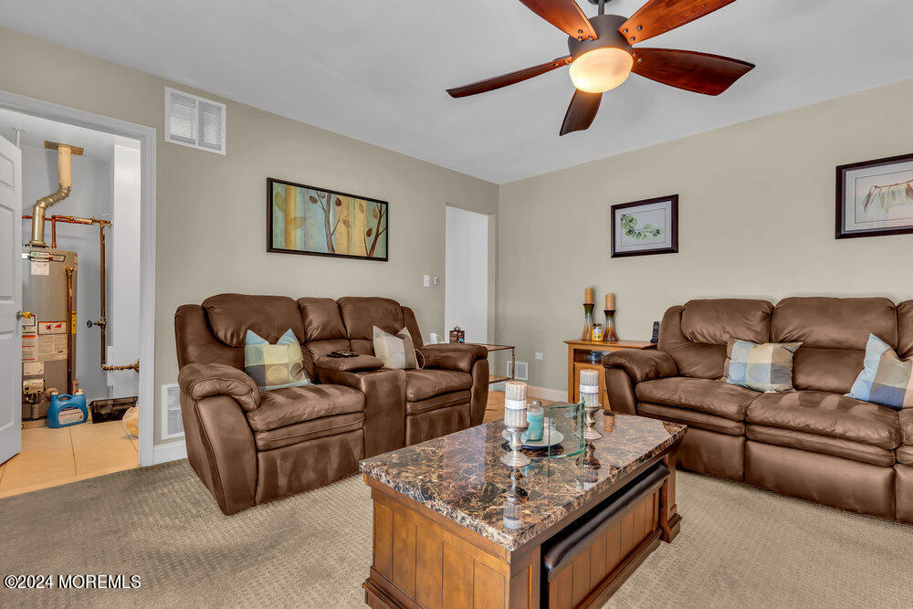 3 Ash Road Jackson, NJ 08527 - Photo 13 of 21 a living room with furniture and a rug