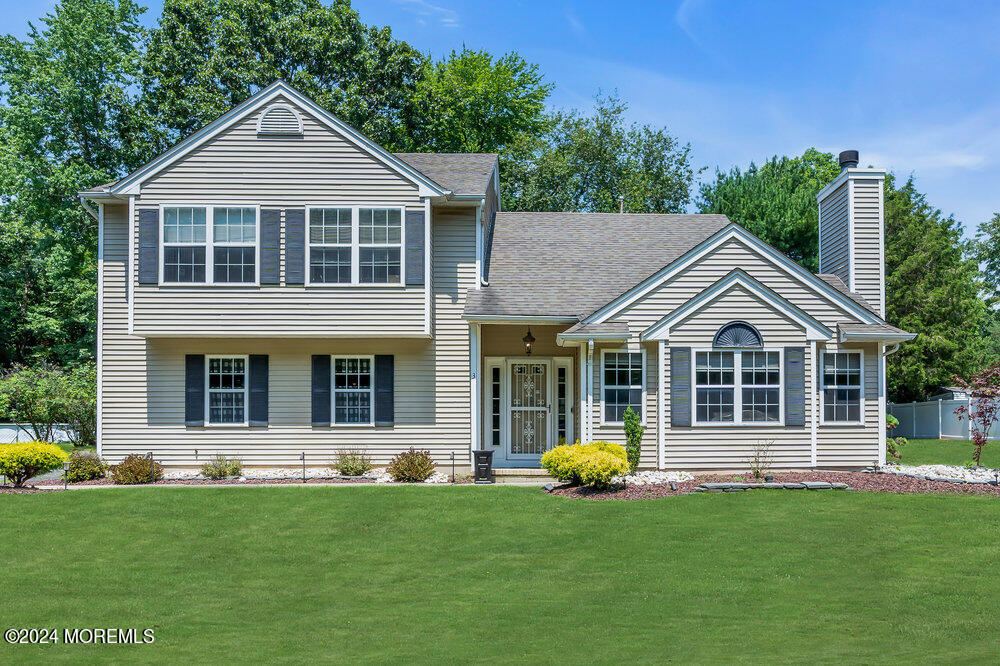 3 Ash Road Jackson, NJ 08527 - Photo 2 of 21 a front view of a house with swimming pool and porch