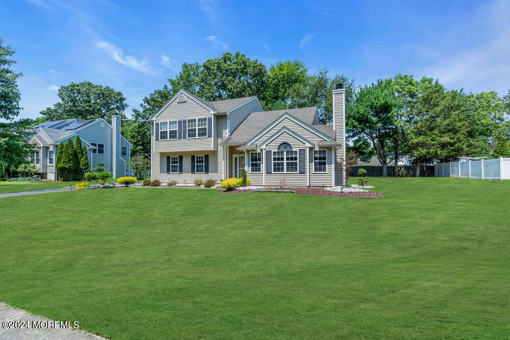 3 Ash Road Jackson, NJ 08527 - Photo 4 of 21 a front view of a house with a garden