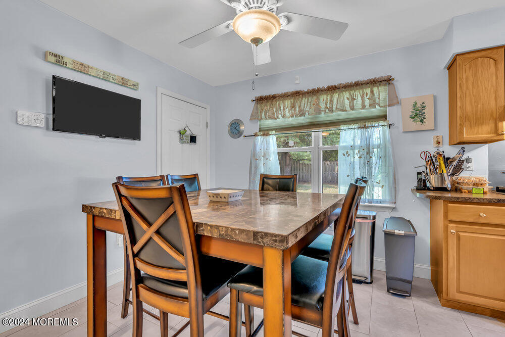 3 Ash Road Jackson, NJ 08527 - Photo 8 of 21 a view of a dining room with furniture and wooden floor