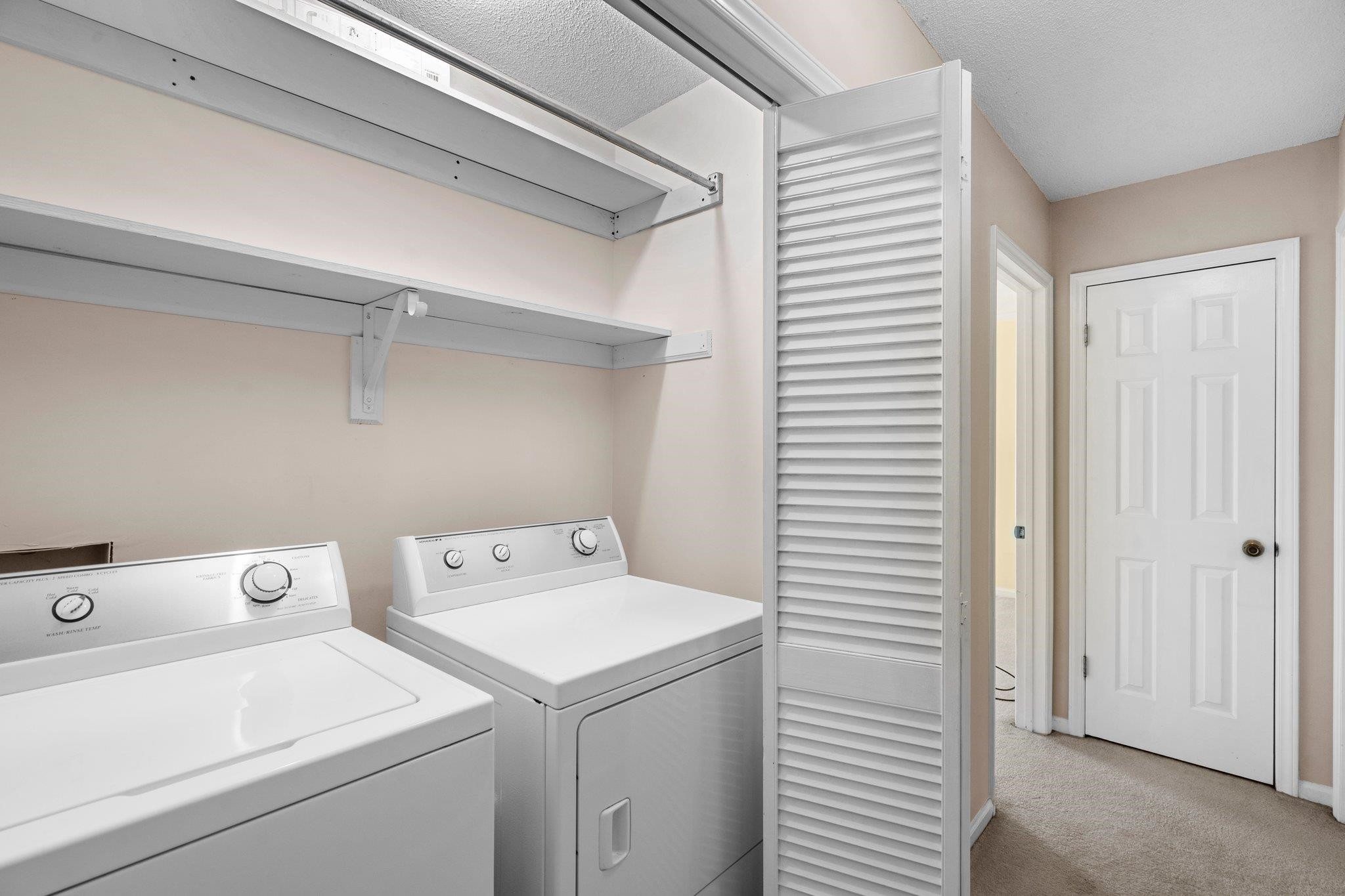 214 Wetherburn Lane Raleigh, NC 27615 - Photo 23 of 31 Upstairs laundry. Washer/Dryer Included.