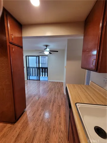 a bed room with a bed and a book shelf