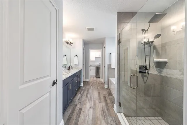 a spacious bathroom with a shower