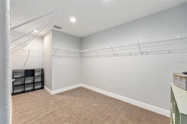 a view of a room with racks on the wall