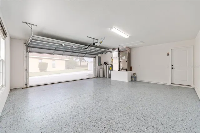 a view of empty room with white walls