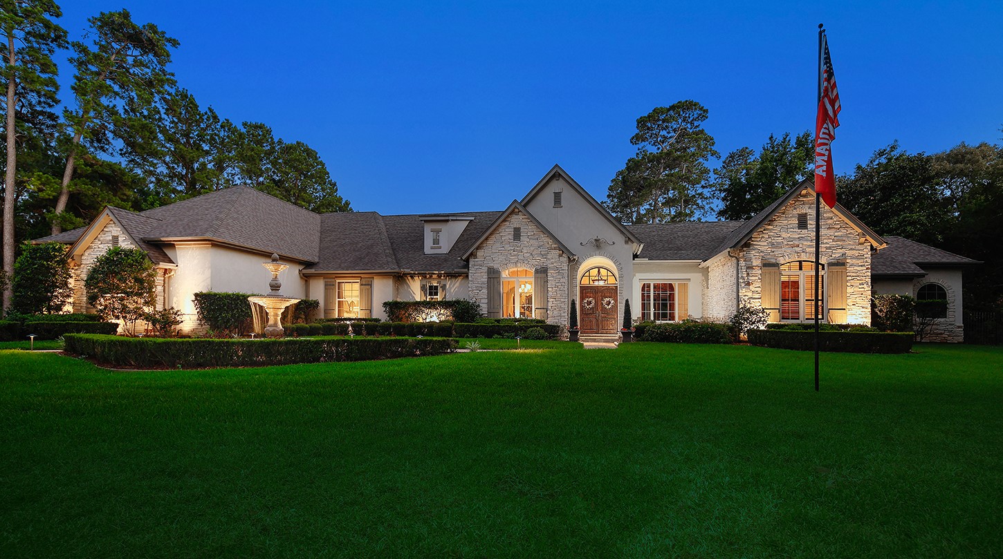 119 Angel Leaf Road The Woodlands, TX 77380 - Photo 1 of 50 a front view of a house with a garden