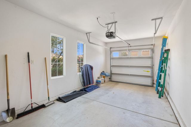 a view of room with hardwood floor and window