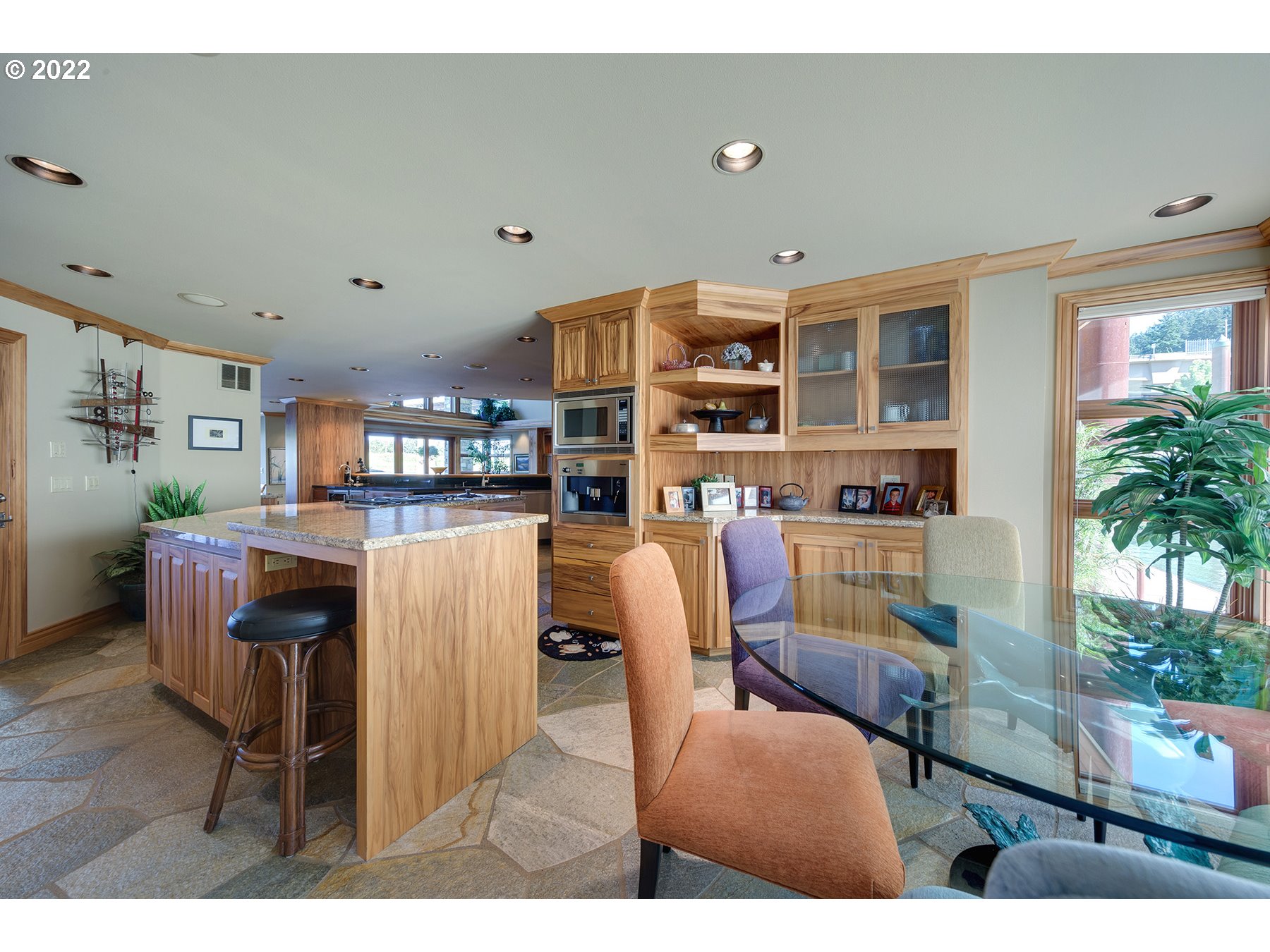 14561 Northwest Larson Road, Unit 16 17 Portland, OR 97231 - Photo 12 of 32 a dining room with furniture and a floor to ceiling window