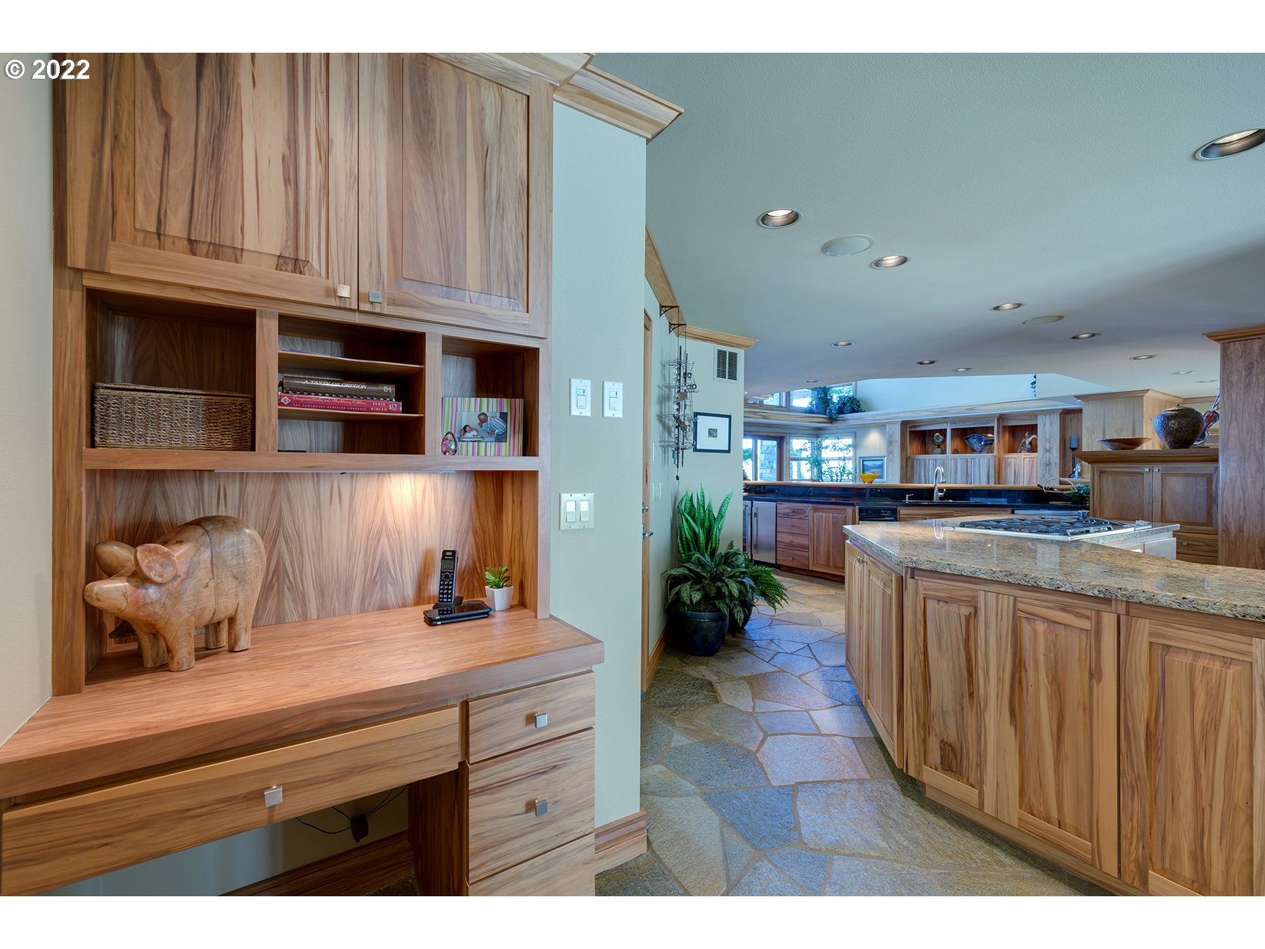 14561 Northwest Larson Road, Unit 16 17 Portland, OR 97231 - Photo 13 of 32 a kitchen with cabinets a sink and a stove