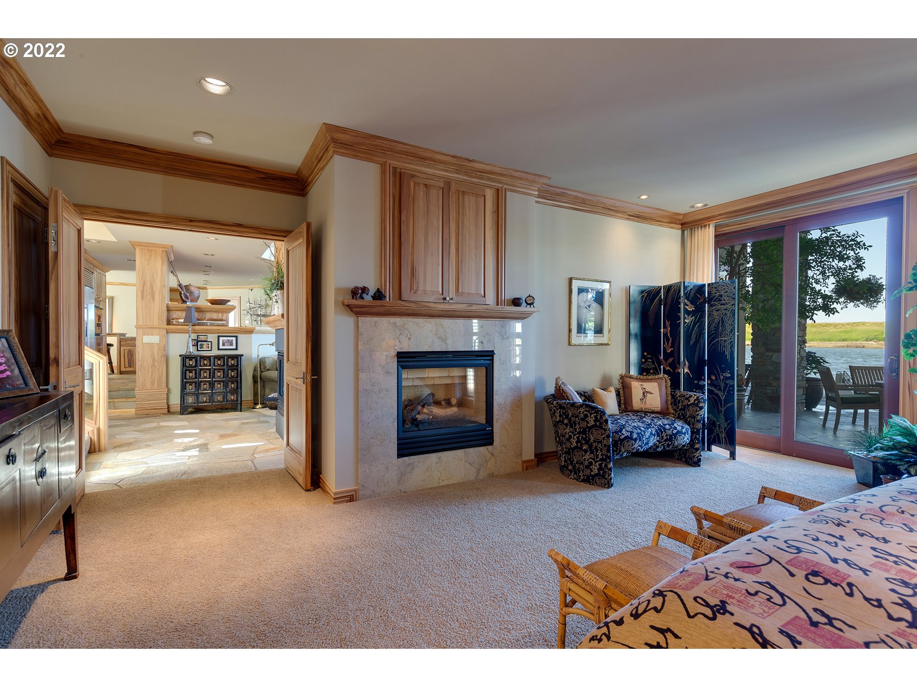 14561 Northwest Larson Road, Unit 16 17 Portland, OR 97231 - Photo 15 of 32 a living room with furniture and a fireplace