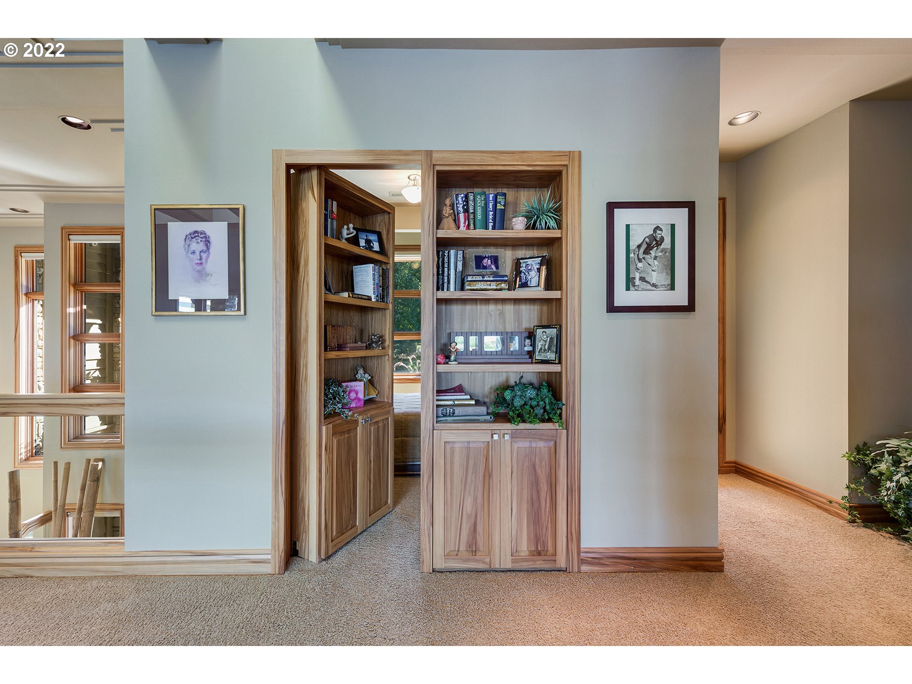 14561 Northwest Larson Road, Unit 16 17 Portland, OR 97231 - Photo 19 of 32 a living room with furniture and a book shelf
