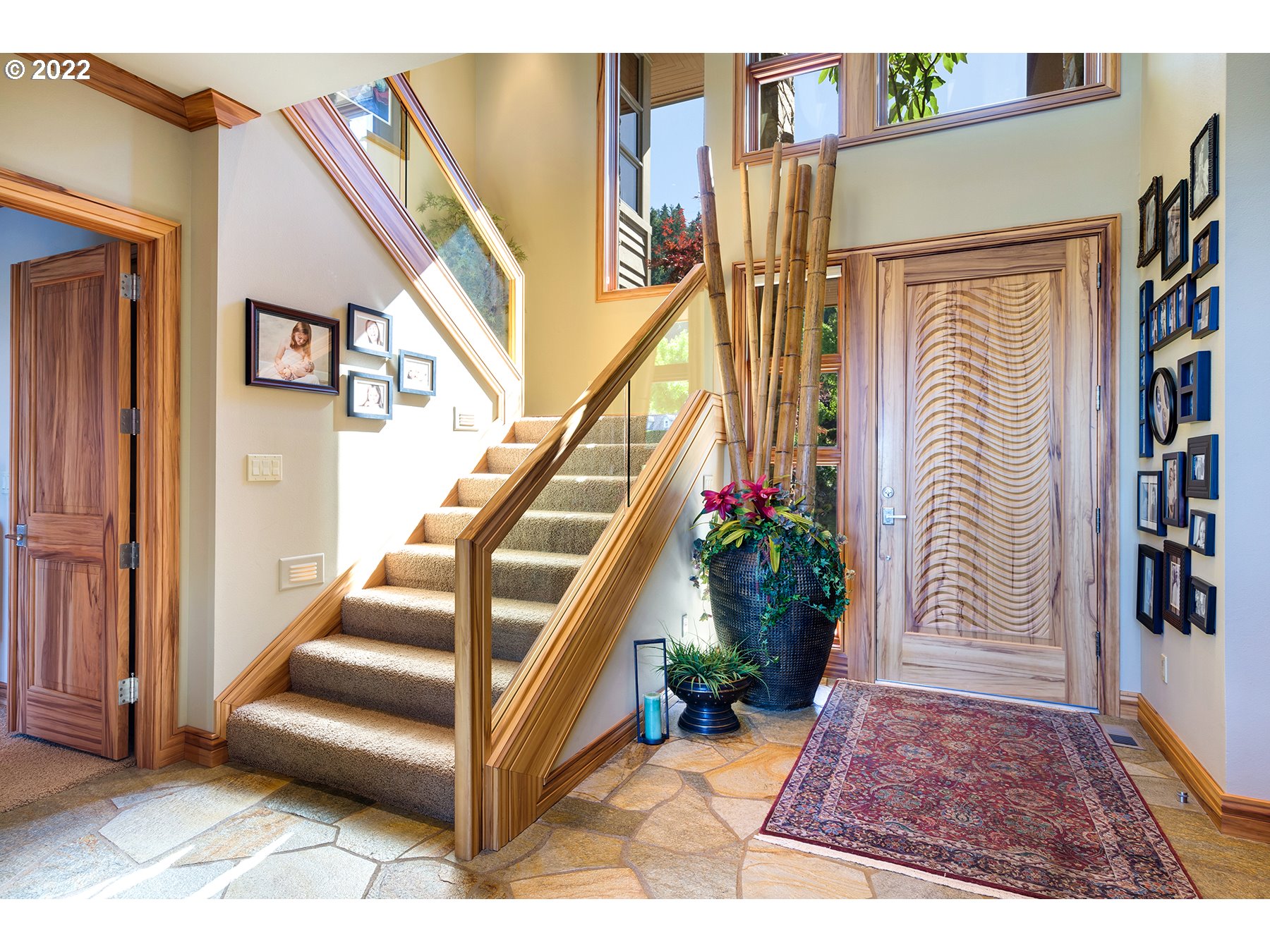 14561 Northwest Larson Road, Unit 16 17 Portland, OR 97231 - Photo 5 of 32 a view of entryway and hall with wooden floor