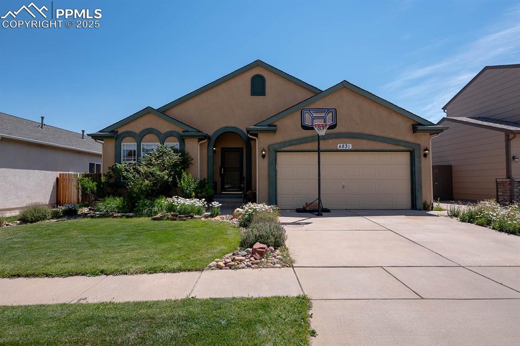 Great Curbside Appeal on this lovely Ranch Style Home.  Landscaped front and back.