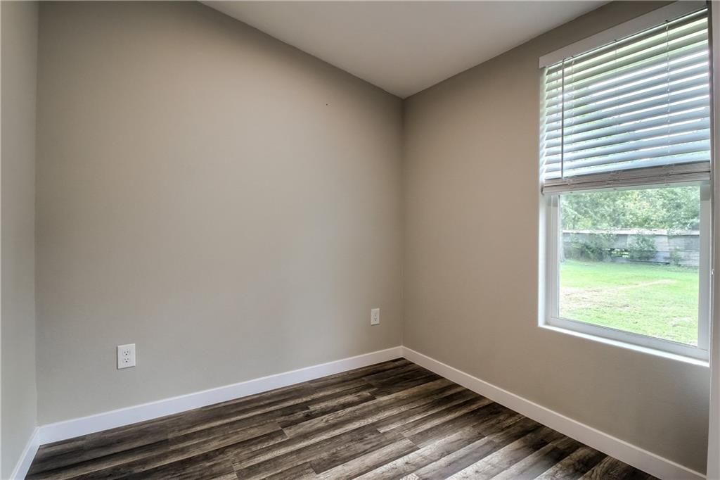 108 Irene Street Elgin, TX 78621 - Photo 11 of 22 an empty room with a window
