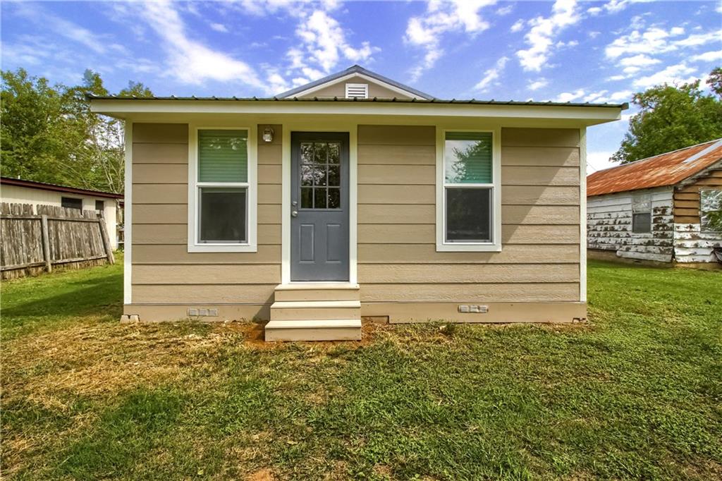 108 Irene Street Elgin, TX 78621 - Photo 22 of 22 a view of a house with a yard