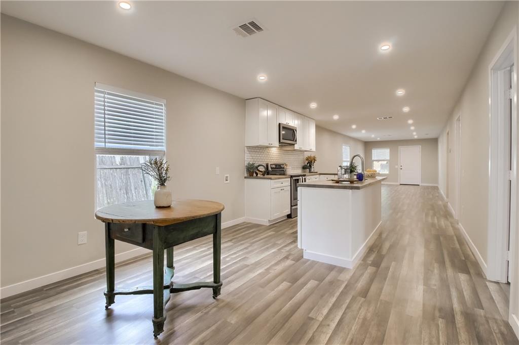 108 Irene Street Elgin, TX 78621 - Photo 7 of 22 a view of kitchen with breakfast area
