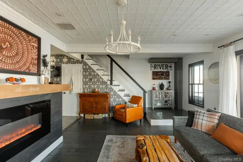 a bathroom with a sink a toilet and shower curtain