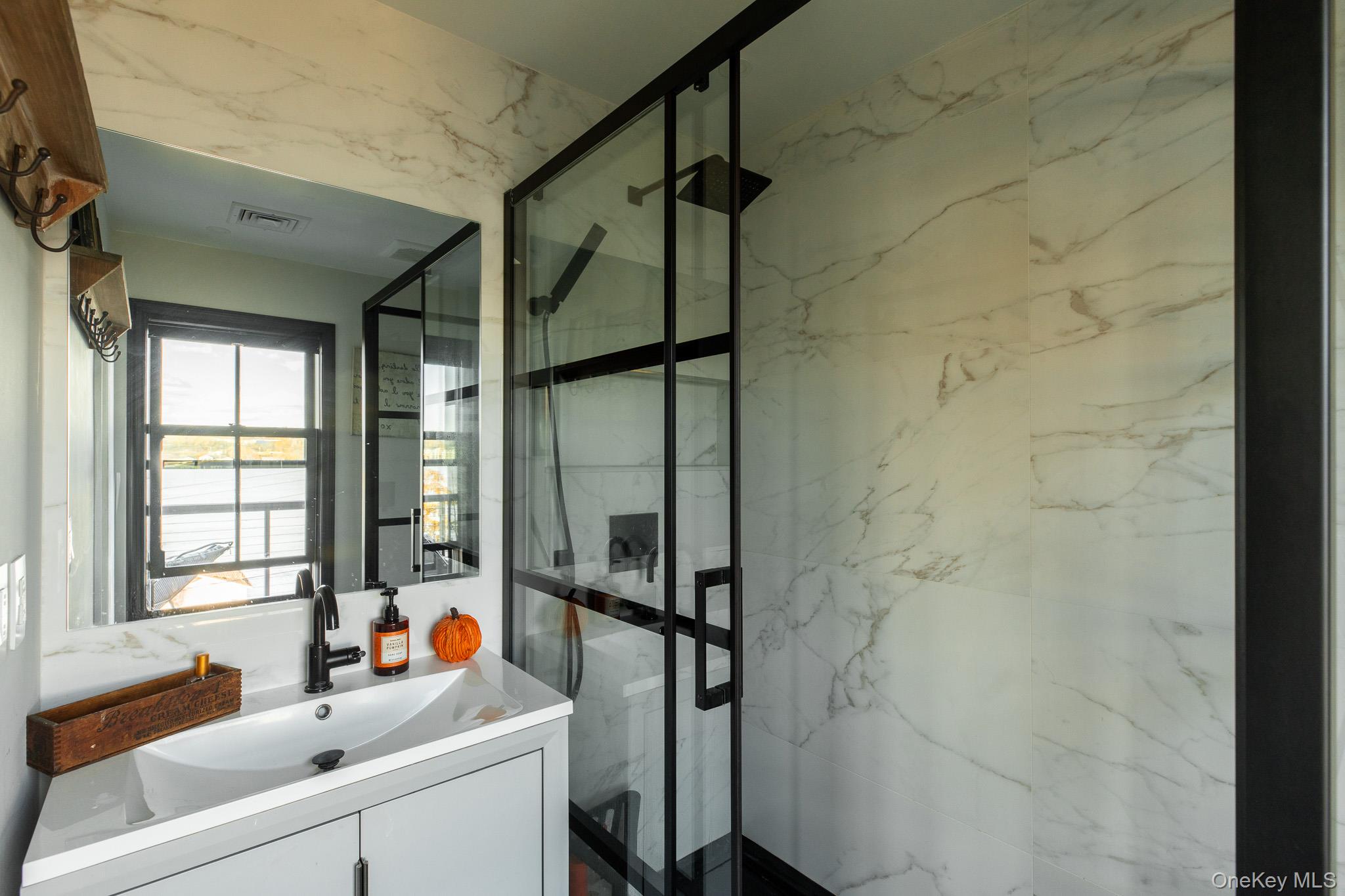 5 Willow Dock Road Highland, NY 12528 - Photo 20 of 36 a bathroom with a sink and a shower