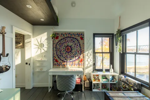 a view of a glass door and an outdoor window
