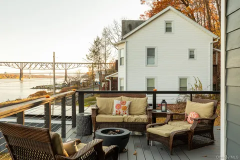 a view of a house with roof deck