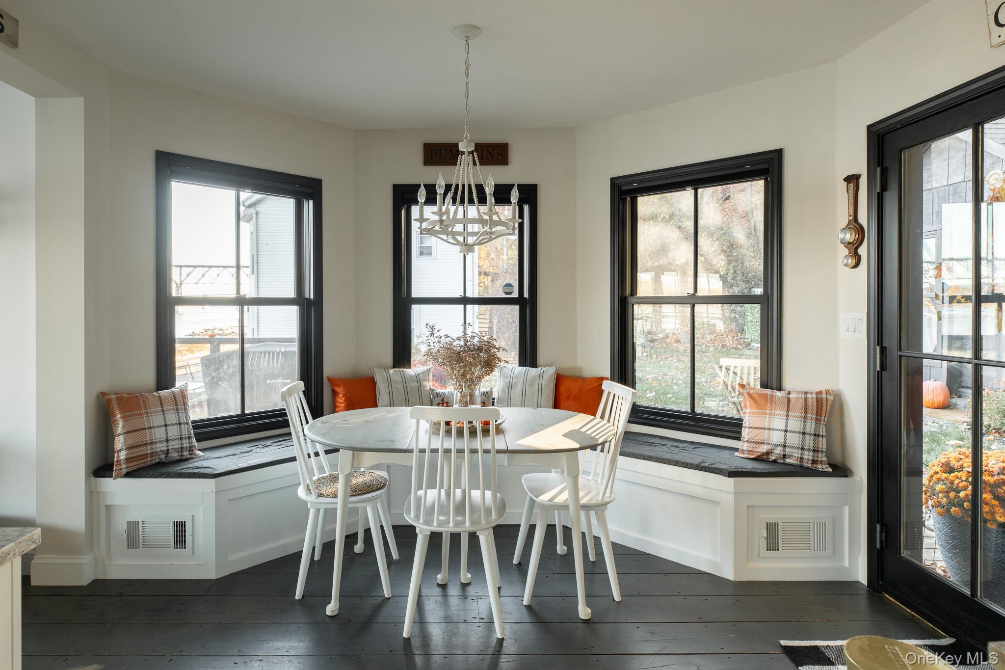 5 Willow Dock Road Highland, NY 12528 - Photo 3 of 36 a view of a dining room with furniture large windows and wooden floor