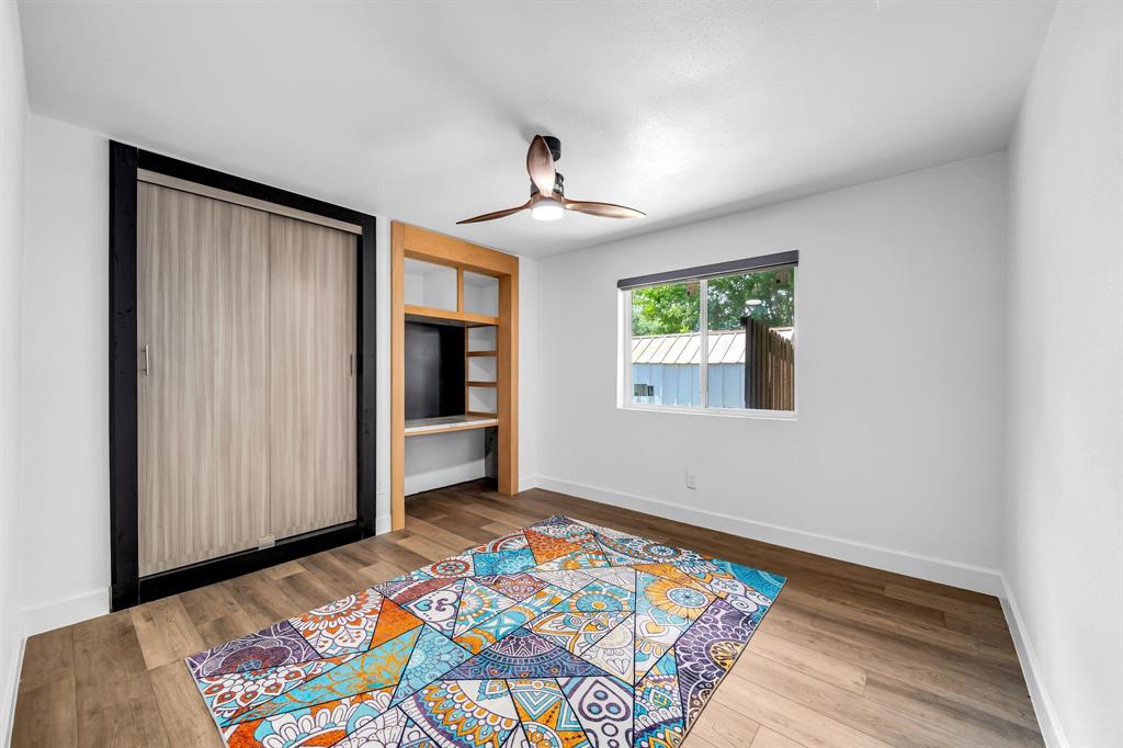 4122 Azalea Lane Garland, TX 75043 - Photo 18 of 26 a bedroom with bed and a window
