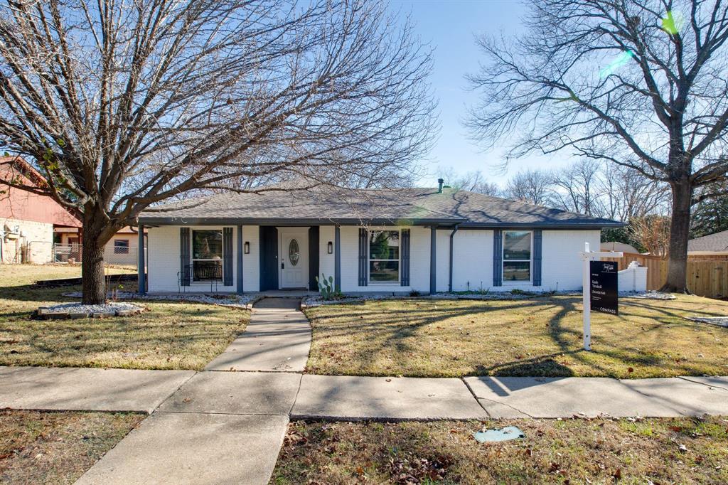 4122 Azalea Lane Garland, TX 75043 - Photo 2 of 26 a front view of a house with swimming pool and patio