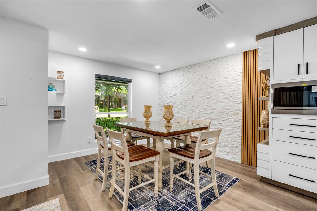 4122 Azalea Lane Garland, TX 75043 - Photo 6 of 26 a view of a dining room with furniture and a window