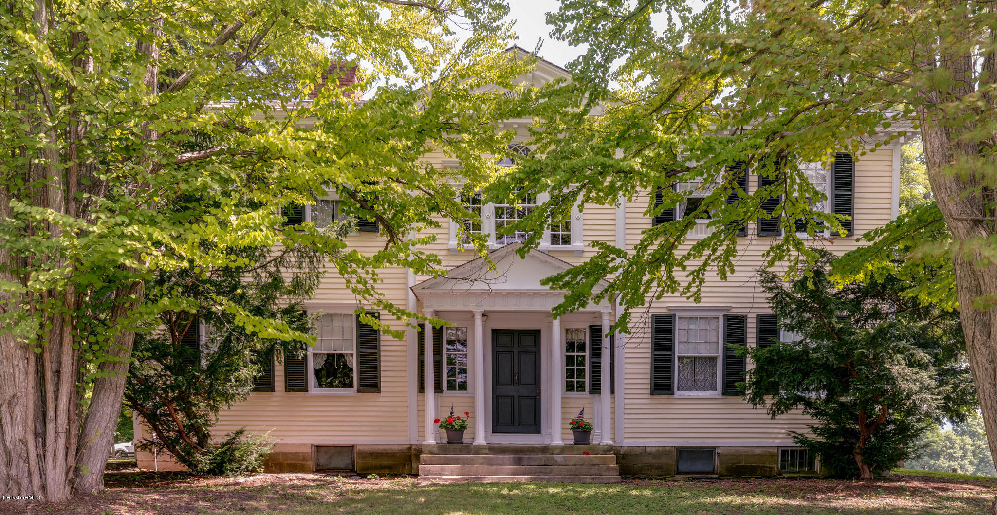 1385 State Road Richmond, MA 01254 - Photo 1 of 25 a front view of a house with garden