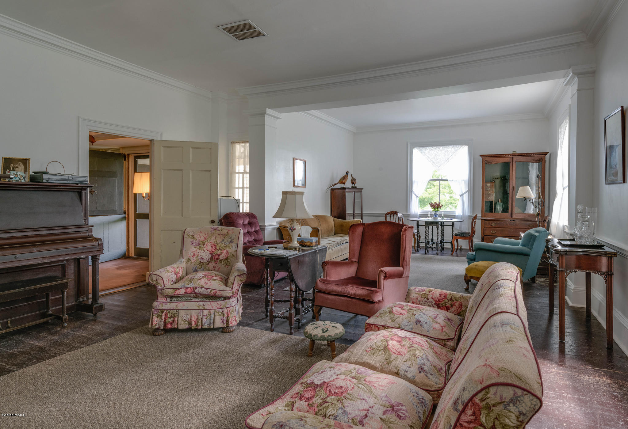 1385 State Road Richmond, MA 01254 - Photo 18 of 25 a living room with furniture and a dining table