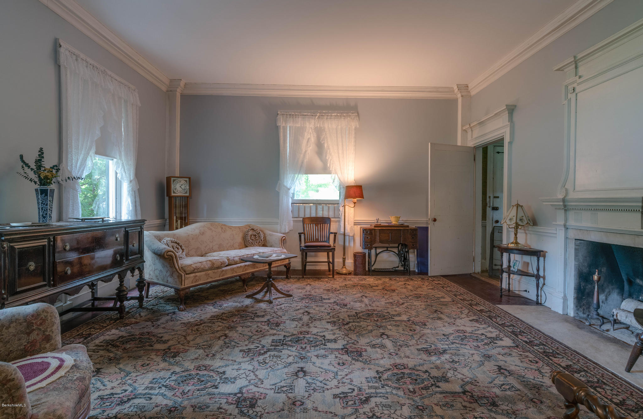 1385 State Road Richmond, MA 01254 - Photo 19 of 25 a bedroom with furniture and a fireplace
