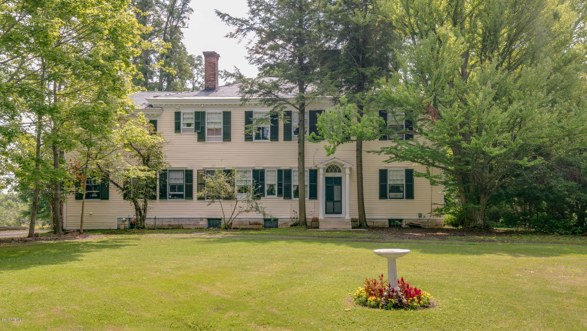 1385 State Road Richmond, MA 01254 - Photo 3 of 25 a front view of house with yard and seating area