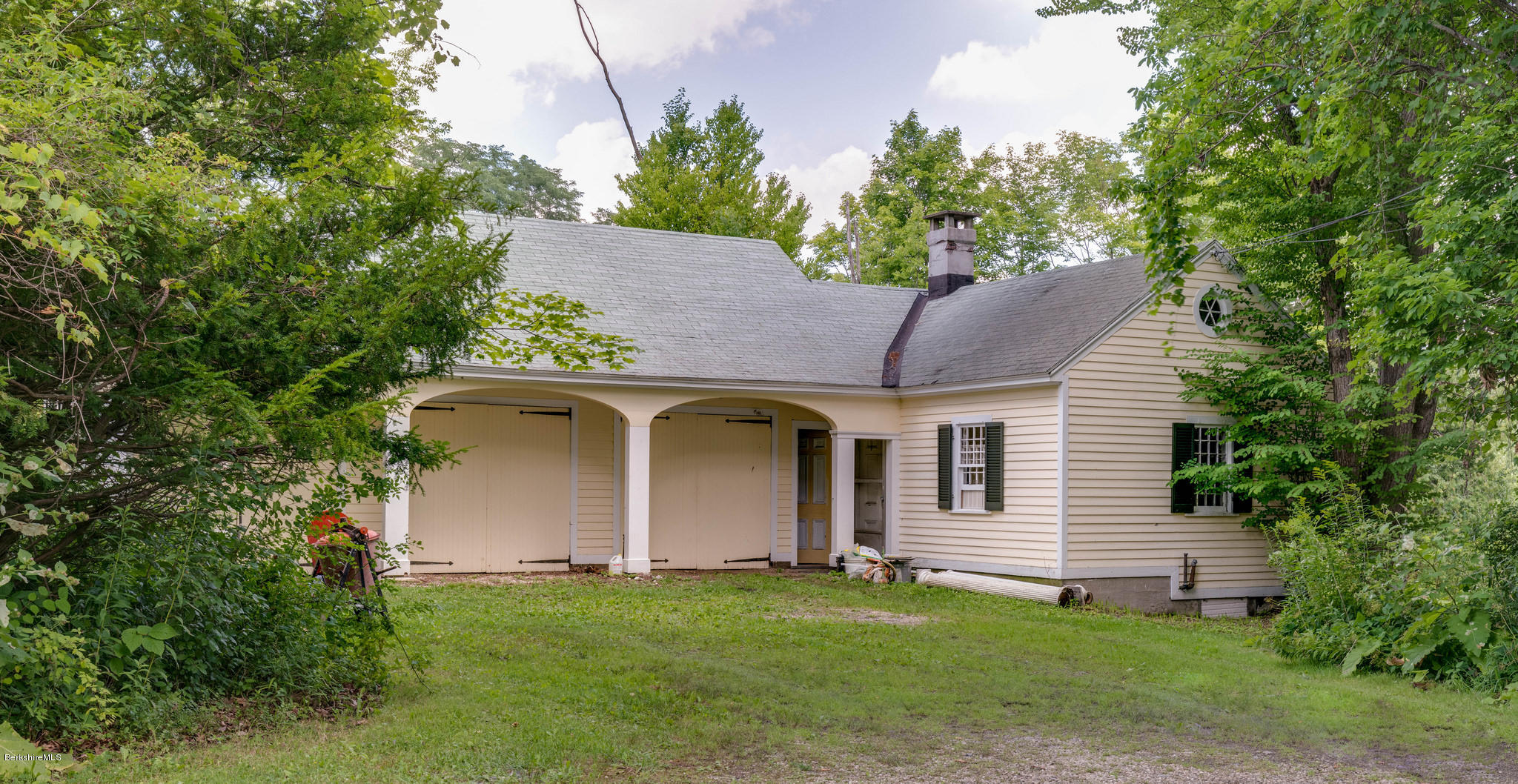 1385 State Road Richmond, MA 01254 - Photo 22 of 25 a front view of house with yard and trees