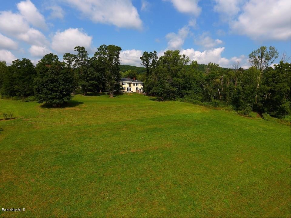 1385 State Road Richmond, MA 01254 - Photo 24 of 25 a view of a field of grass and trees