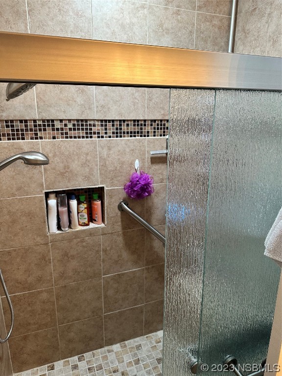 2502 Umbrella Tree Drive Edgewater, FL 32141 - Photo 15 of 26 a bathroom with a shower