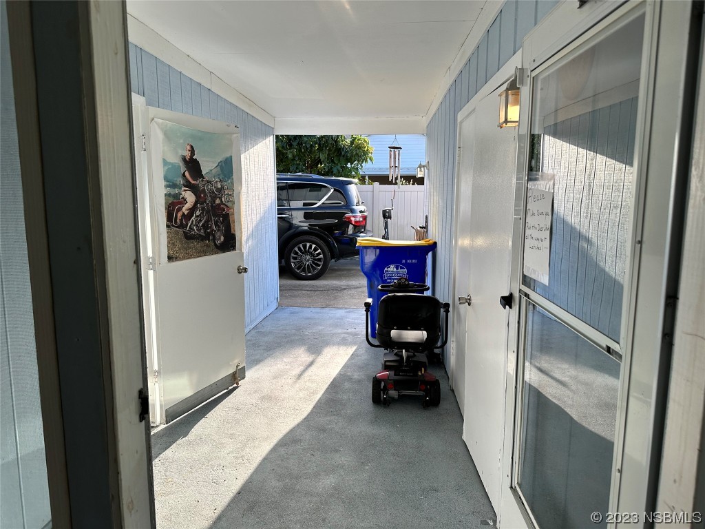 2502 Umbrella Tree Drive Edgewater, FL 32141 - Photo 19 of 26 a view of living room with furniture and a window