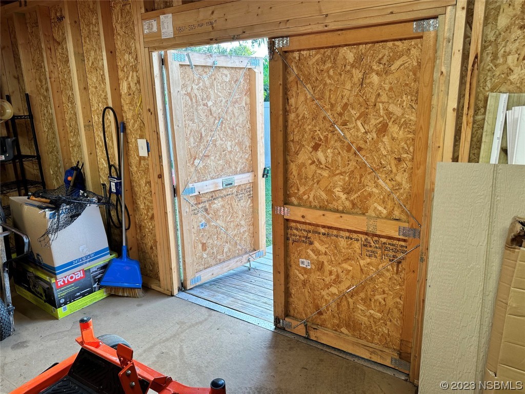 2502 Umbrella Tree Drive Edgewater, FL 32141 - Photo 23 of 26 a room with storage and utility