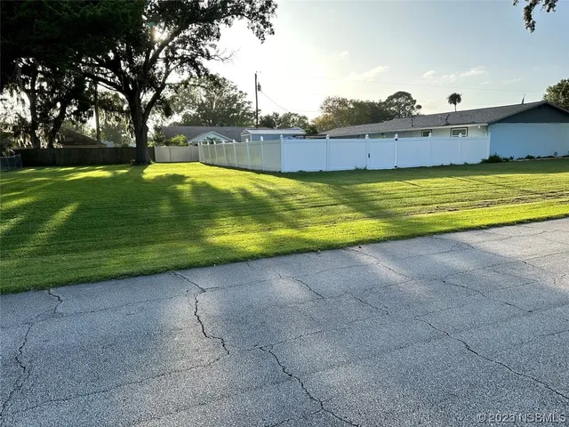 a view of swimming pool with an outdoor space and seating area