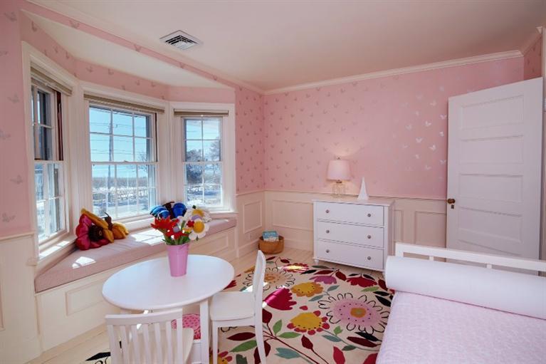 150 Sea View Avenue Osterville, MA 02655 - Photo 13 of 26 a bed room with a bed and a dresser