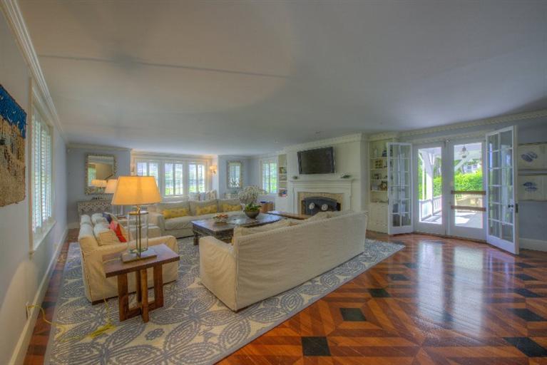 150 Sea View Avenue Osterville, MA 02655 - Photo 5 of 26 a living room with fireplace furniture and a large window